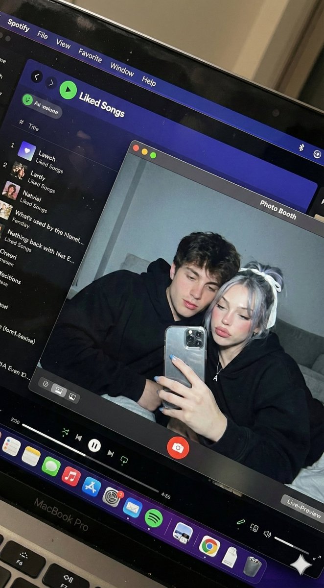 Candid Moments: Love in the Glow of a MacBook AI prompt preview